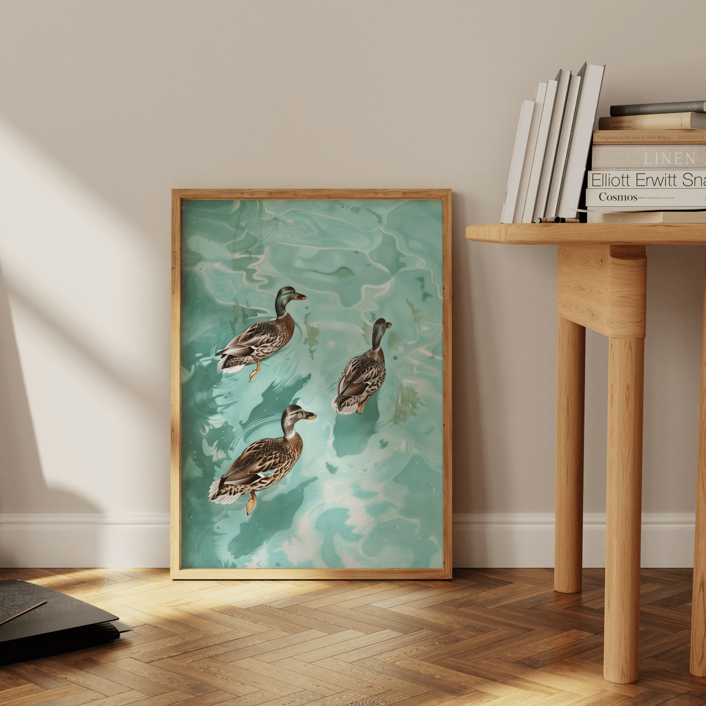 Paw Prints painting of three Cayuga ducks swimming in crystal clear water, leaning against the office floor.