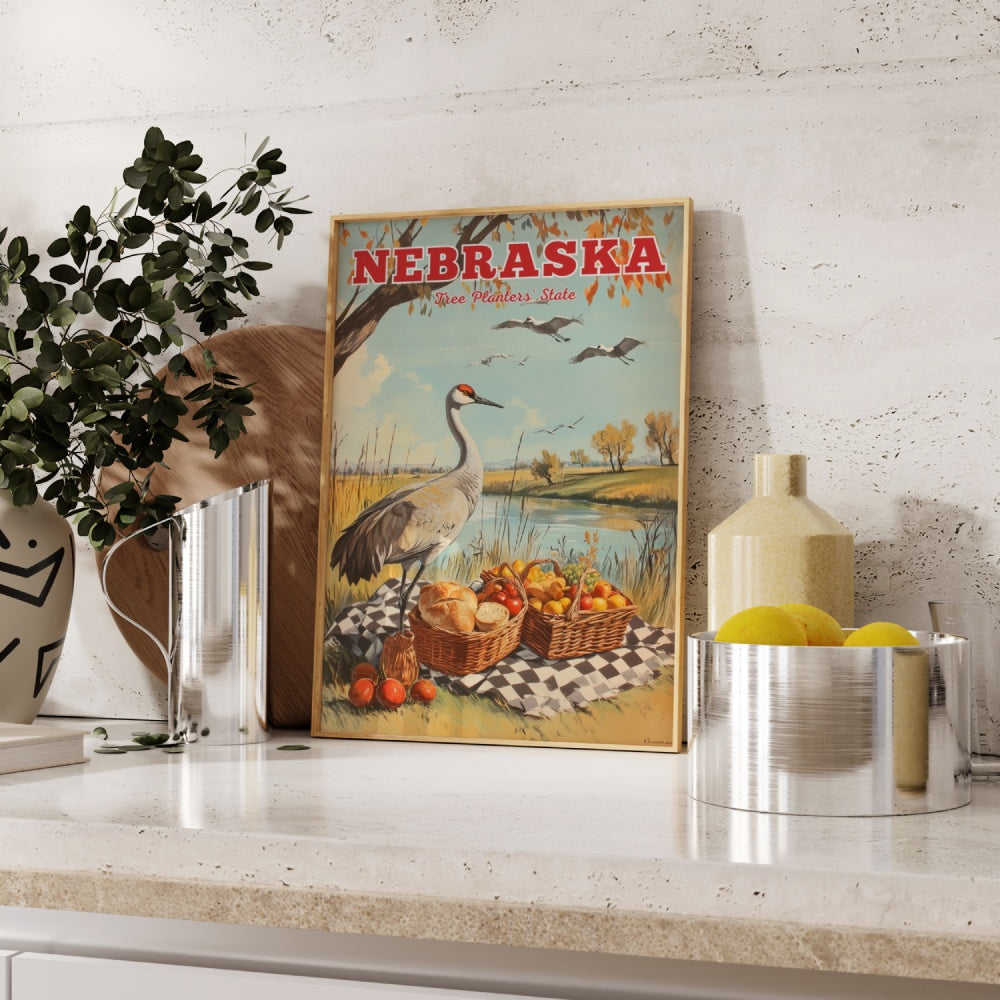 "Nebraska", a vintage travel poster, featuring a Sandhill Crane having a picnic in autumn Nebraska by a lake