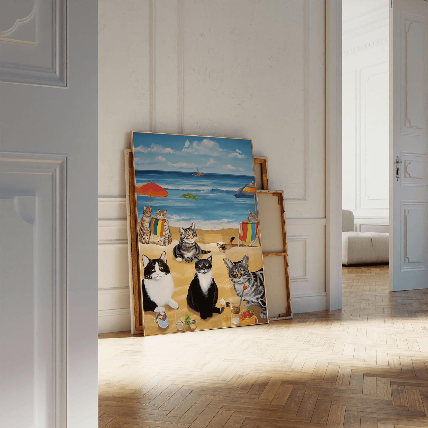 Paw Prints framed painting of a bunch of cats enjoying a beach day, leaning against a white bathroom wall.