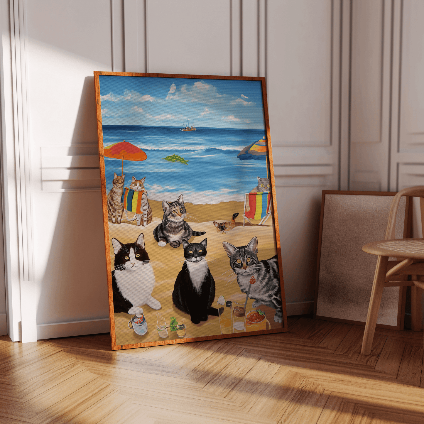 Paw Prints painting of a bunch of cats enjoying a beach day, in a white Victorian hallway in view of natural sunlight.