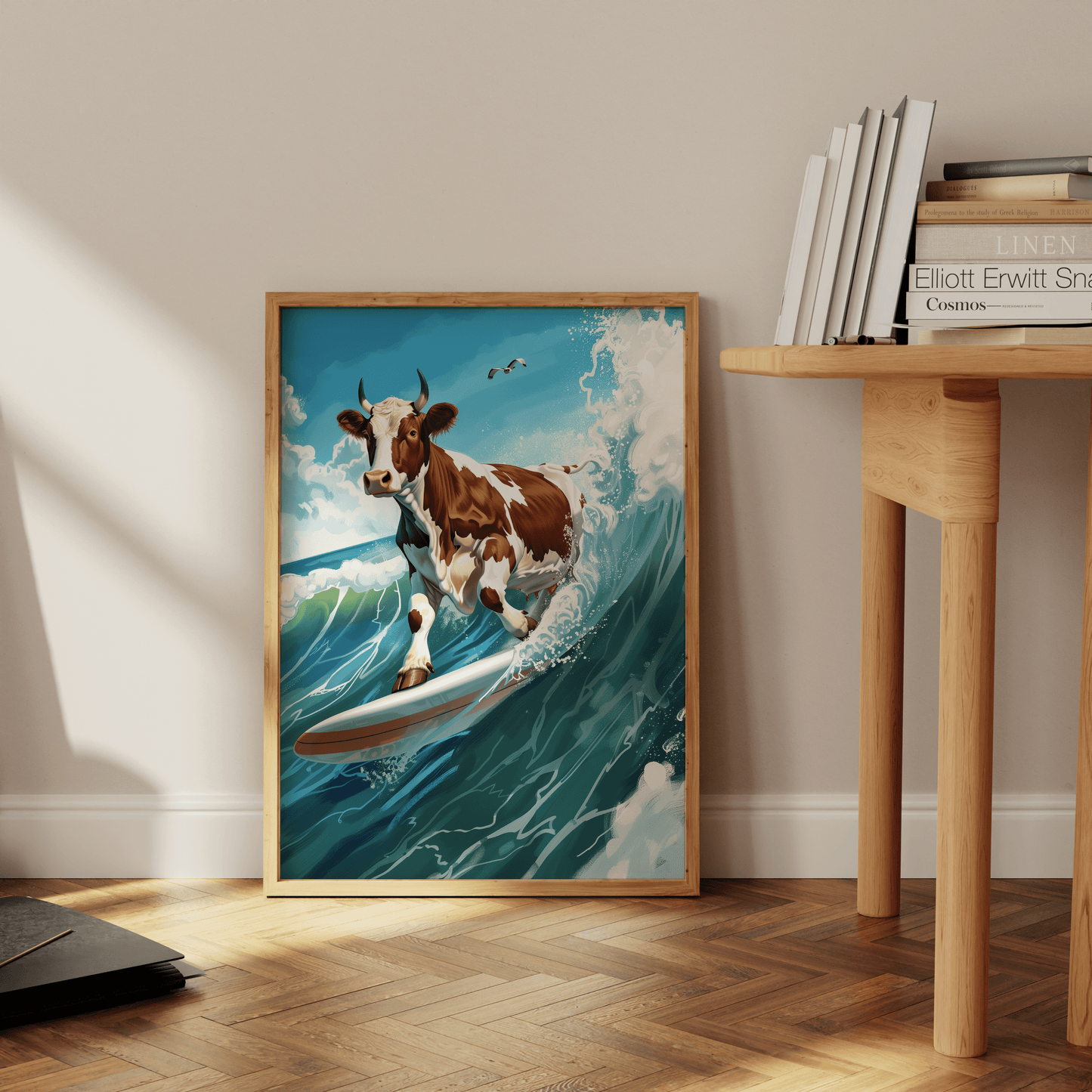 Paw Prints painting of a cow surfing on a wave in sunny San Diego, leaning against the office wall.