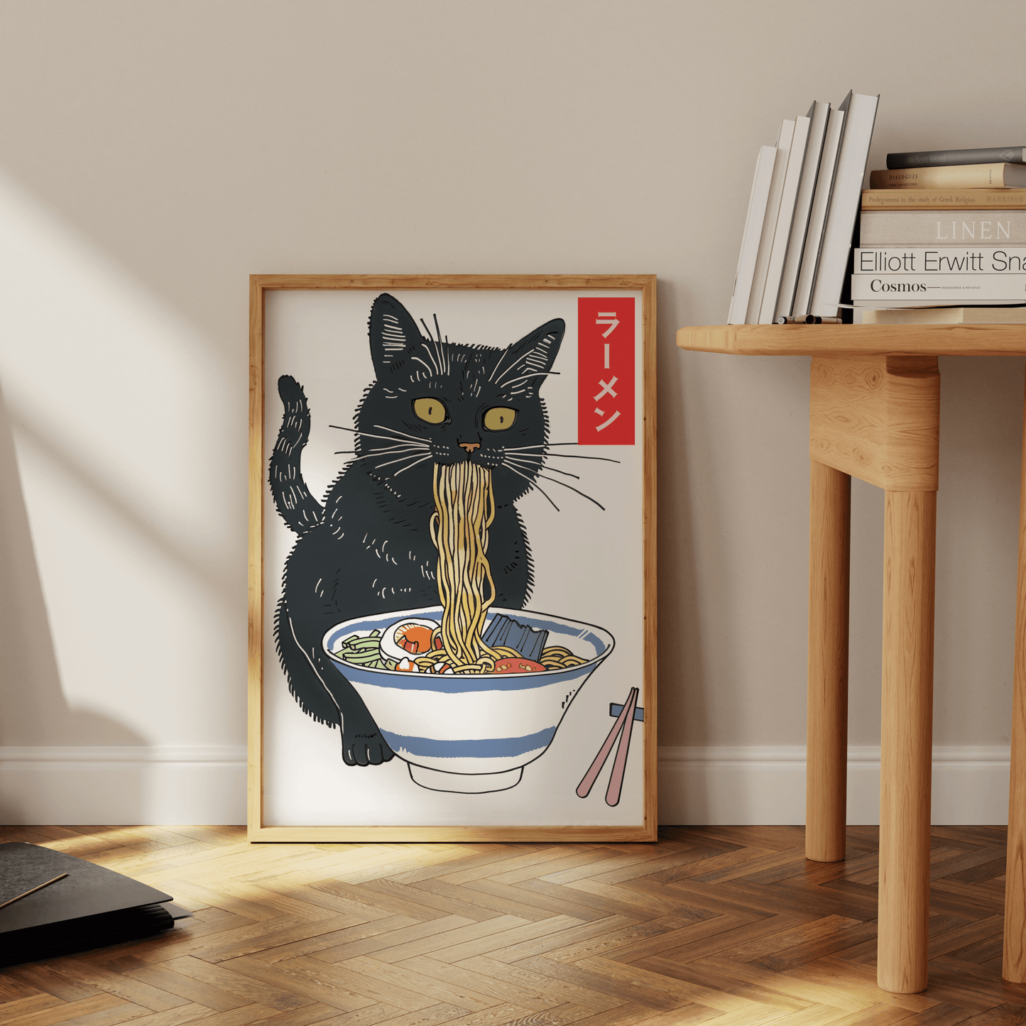 Painting a black cat eating miso ramen, with Japanese labeled "ramen", leaning against the office wall - Paw Prints