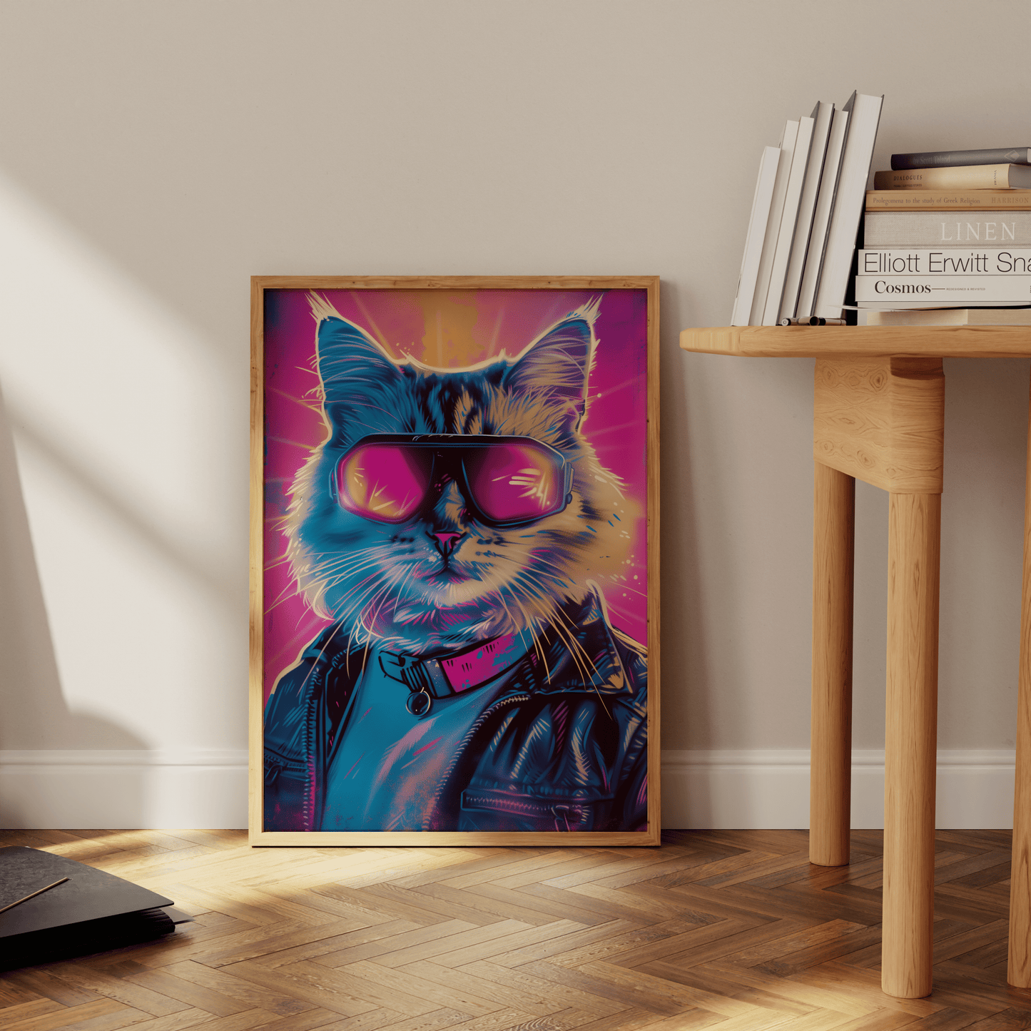 Retro framed poster of a cat wearing goggles and a leather jacket, leaning against the office wall - Paw Prints