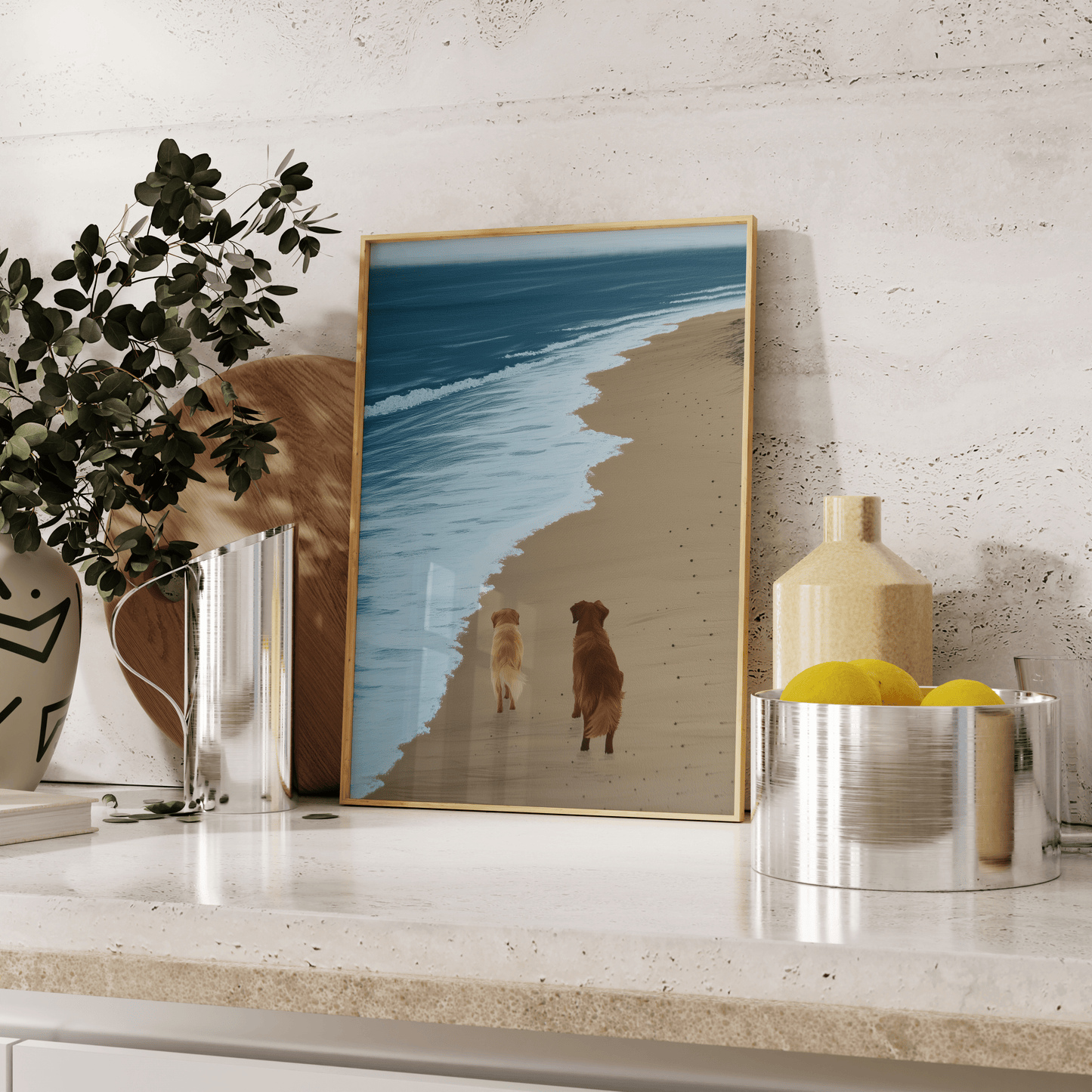 Paw Prints painting of two golden retrievers walking next to a calm ocean, leaning against the kitchen counter.