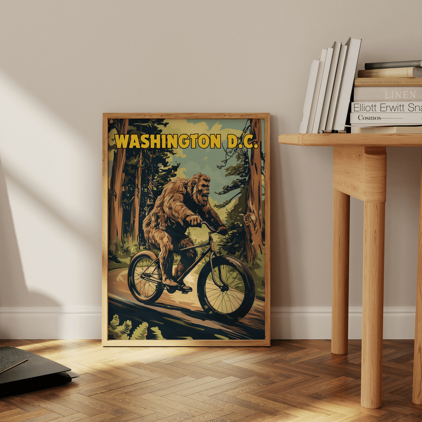 Travel Poster of a Bigfoot riding a bicycle through the forest, titled "Washington DC", leaning against the office wall - Paw Prints