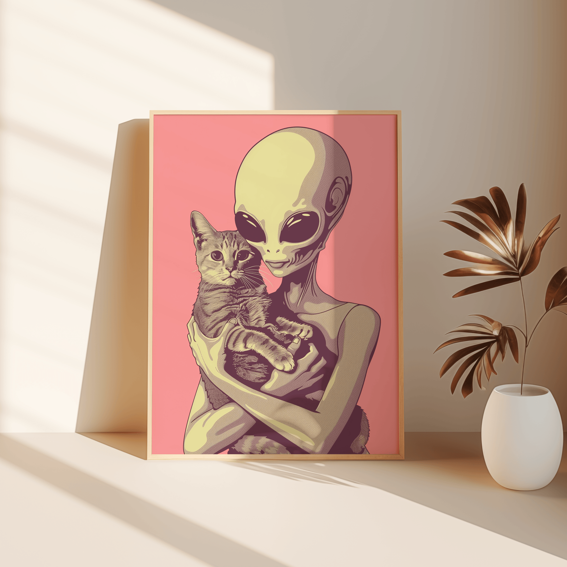 Paw Prints framed poster of a retro alien cradling a tabby cat in a pink background, leaning against the bedroom floor. 
