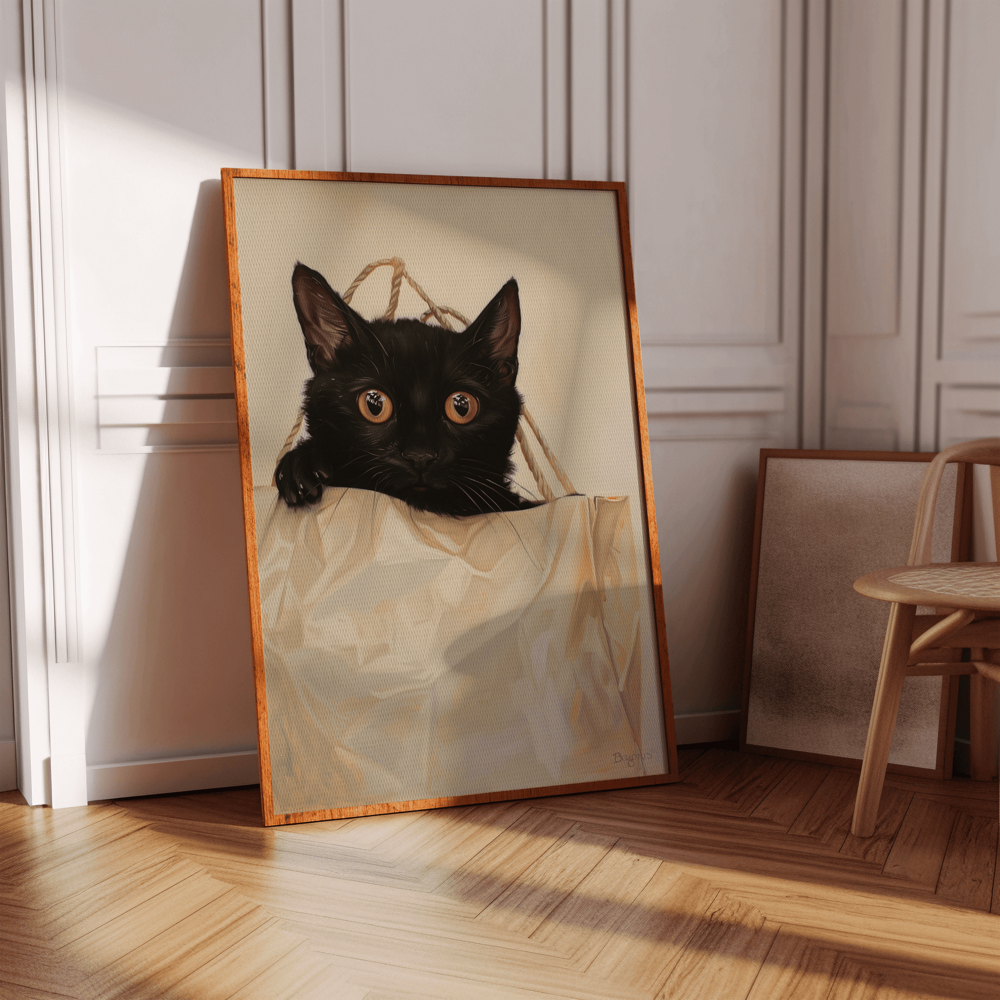 Poster of a black cat peeks out from the top of a brown paper bag, in a white Victorian hallway in view of natural sunlight.