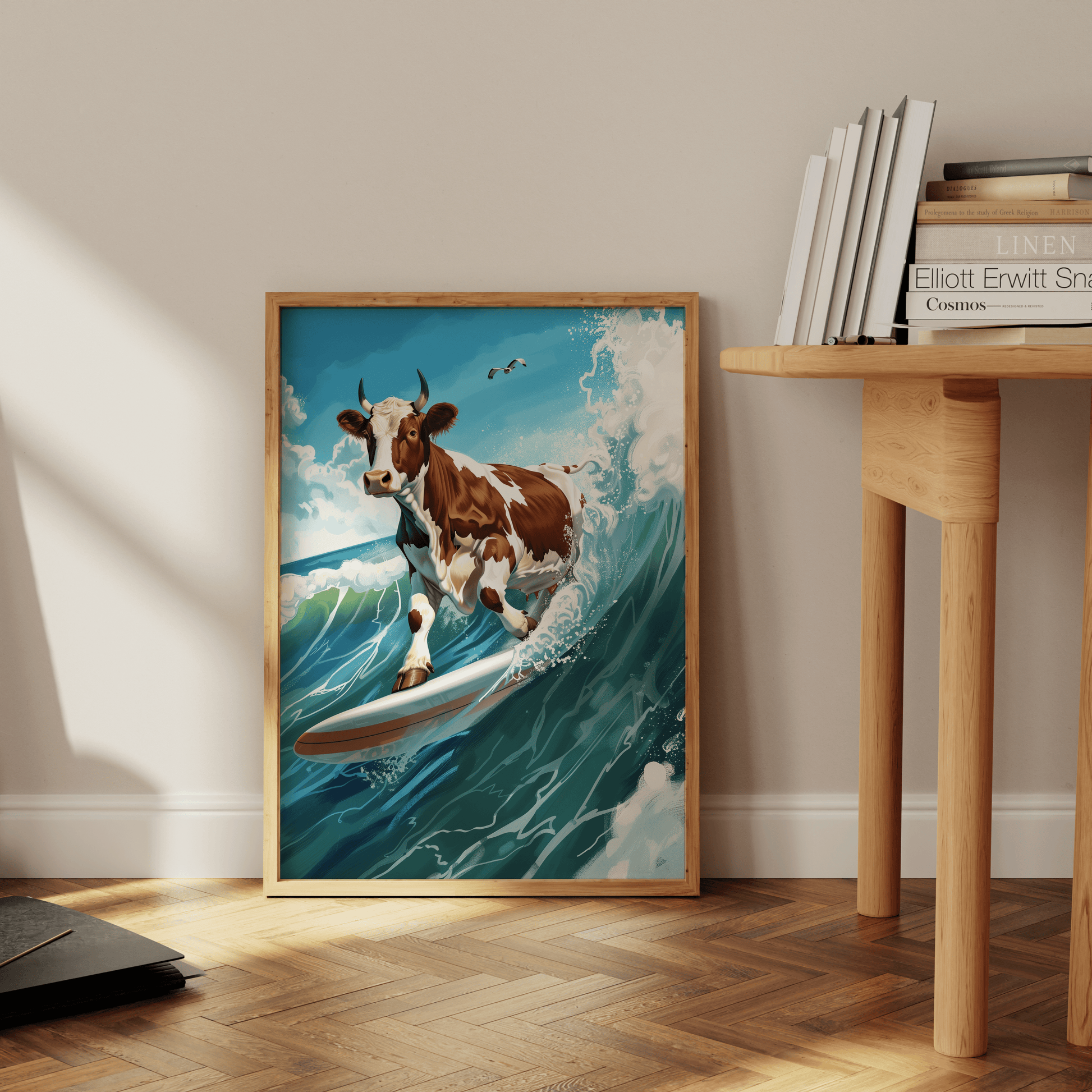 Paw Prints painting of a cow surfing on a wave in sunny San Diego, leaning against the office wall. 