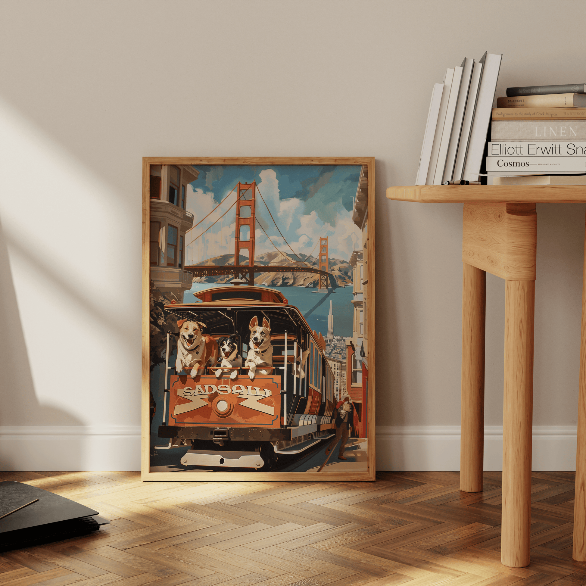 Painting of three dogs on a San Fransisco trolley, next to Golden Gate Bridge, leaning against the office wall - Paw Prints
