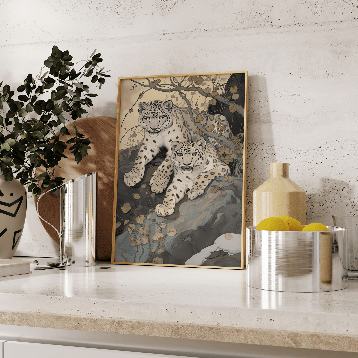 Painting of two twin snow leopards laying in nature, leaning against the kitchen counter - Paw Prints