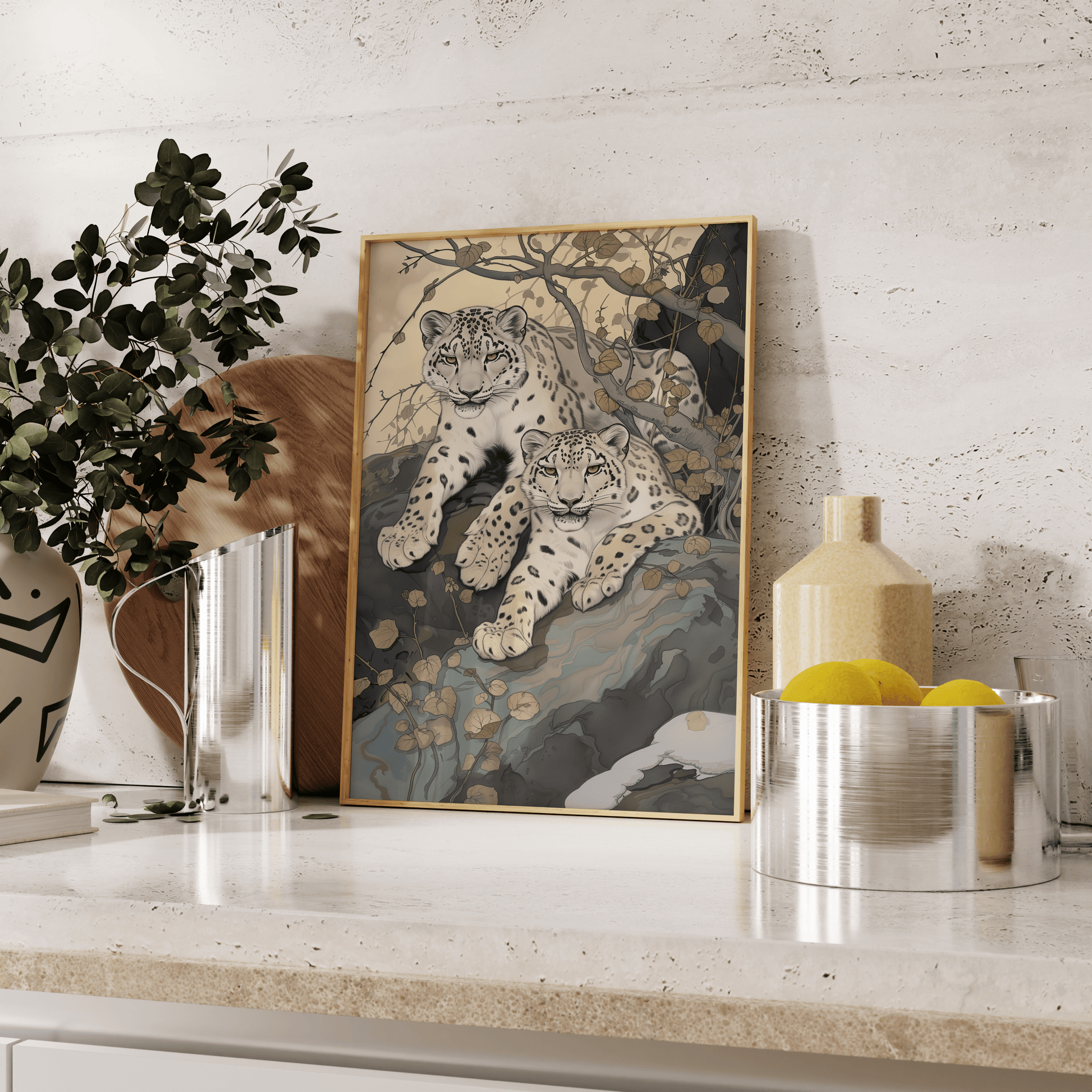 Painting of two twin snow leopards laying in nature, leaning against the kitchen counter - Paw Prints