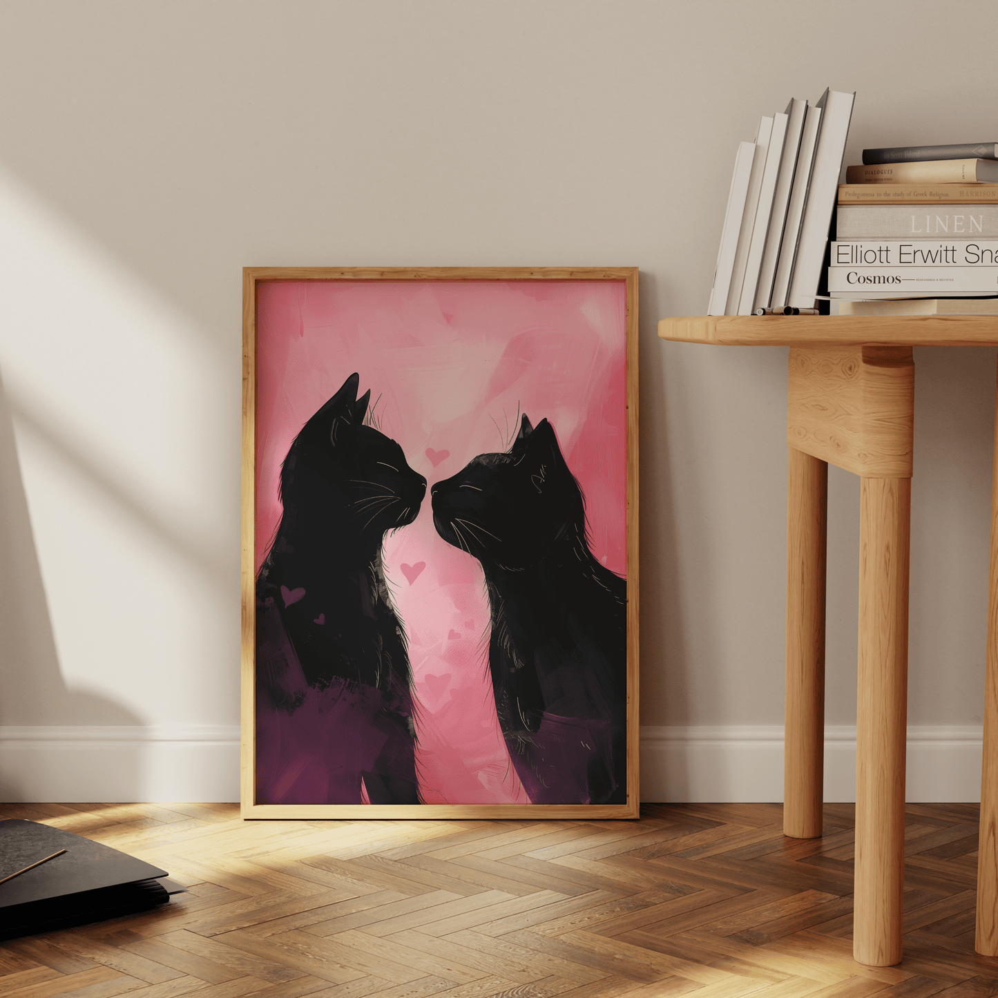 Painting of two black cats in love, pink background with hearts, leaning against the office wall - Paw Prints